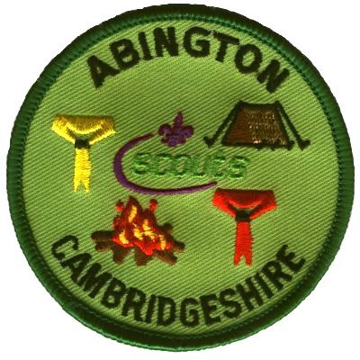 [The Little Abington Campsite badge shows a tent, a campfire, and Scout neckerchiefs]